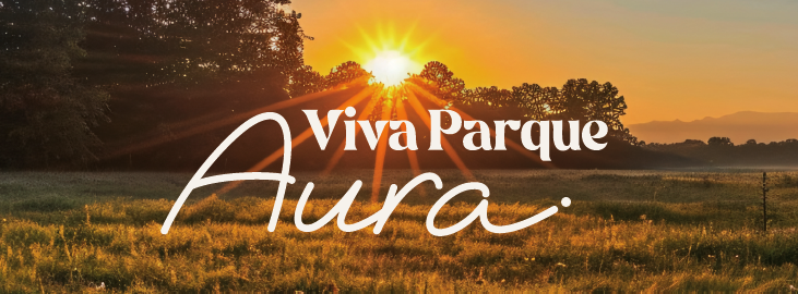 Pôr do sol sobre a área verde do Viva Parque Aura